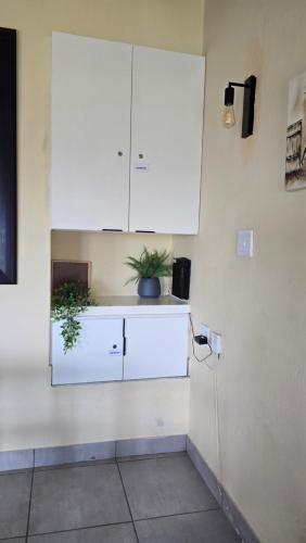 Køkken eller tekøkken på Chakas Rock Chalet 23