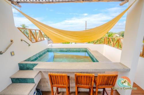 Un balcon sau o terasă la Casa de Las Flores