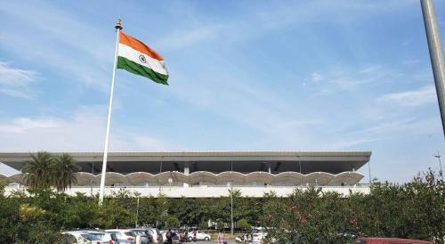 a flag flying in front of a building at Mahadev Home Stay !! Best Homestay Near Chandigarh Int'l Airport !! in Chandigarh Airport