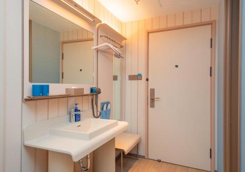 Ένα μπάνιο στο Hanting Hotel Shanghai Gucun Park Subway Station