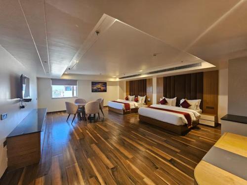 Postel nebo postele na pokoji v ubytování Hotel Elara