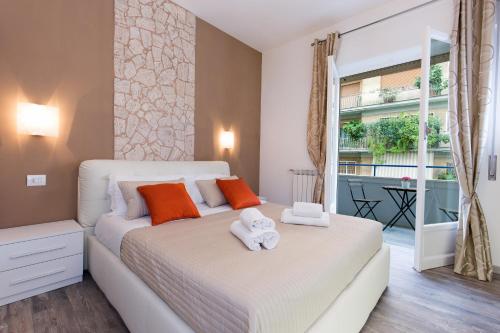 Giường trong phòng chung tại Luxury House Vaticano