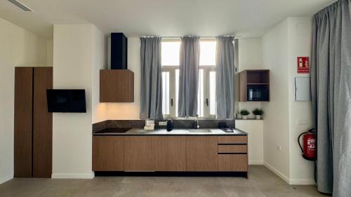 Køkken eller tekøkken på Boutique Room - Plaza Tower