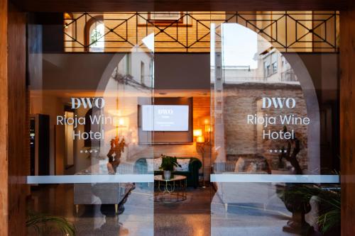 a window of a hotel with the words dvd rico wine hotel at DWO Rioja Wine Hotel in Cenicero