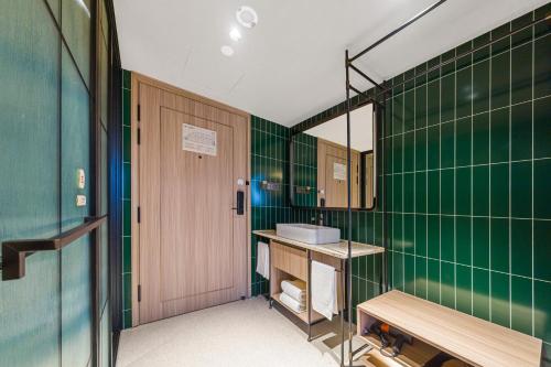 Un baño de Orange Hotel Shanghai Xujiahui Stadium