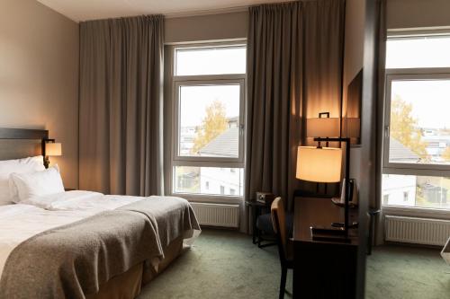 Giường trong phòng chung tại Home Hotel Helma