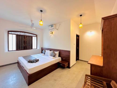 Postel nebo postele na pokoji v ubytování The Ridge Colonial Villa