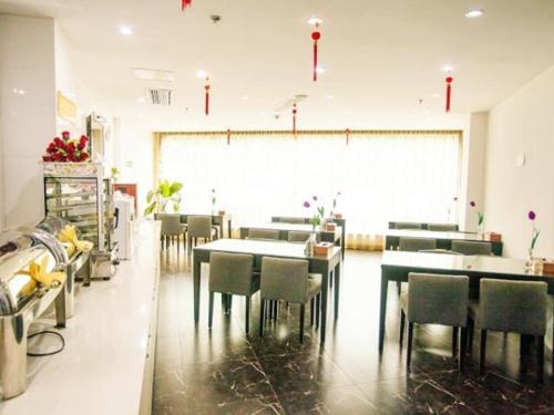 Εστιατόριο ή άλλο μέρος για φαγητό στο Goldmet Inn Wuxi Gonghu Avenue Wanxiangcheng