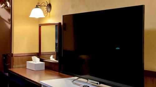 Koupelna v ubytování HAKUBA Moegi HOTEL