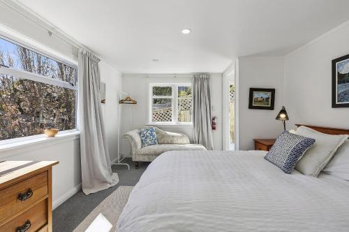 En eller flere senge i et værelse på Little Home on Glanmire