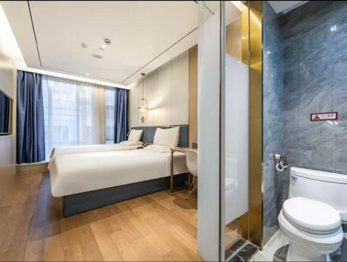 Ένα μπάνιο στο Hanting Hotel Shanghai South Shaanxi Road Subway Station