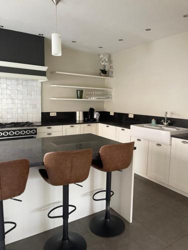 Kuchyň nebo kuchyňský kout v ubytování charmante vakantiewoning nabij Brugge