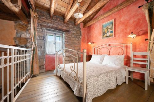 Postel nebo postele na pokoji v ubytování Dobrinja Residence Villas Lopar