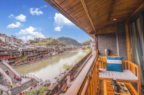 Fotografie z fotogalerie ubytování Fenghuang Sulv Yunzhu River View Homestay v destinaci Feng-chuang