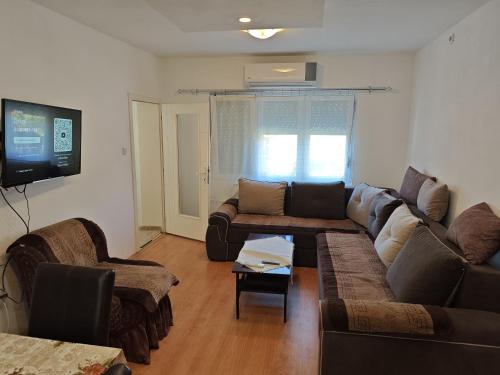 Posezení v ubytování Busi Apartman