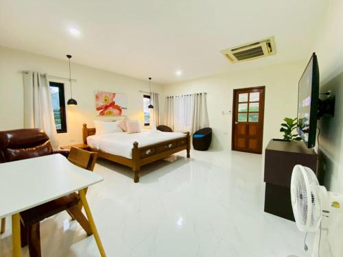 Ένα ή περισσότερα κρεβάτια σε δωμάτιο στο Grand' Pa HomeStay