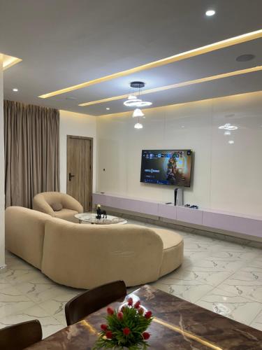 TV a/nebo společenská místnost v ubytování HEKs HOMEs