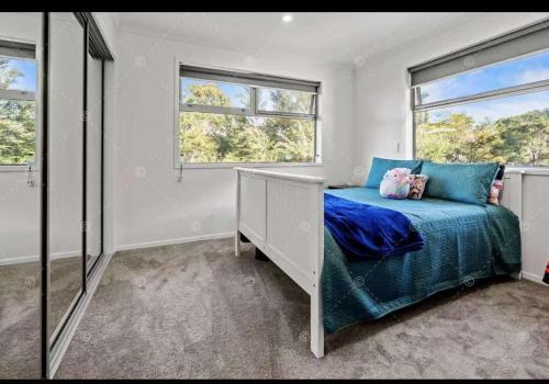 Postel nebo postele na pokoji v ubytování Brown Palace