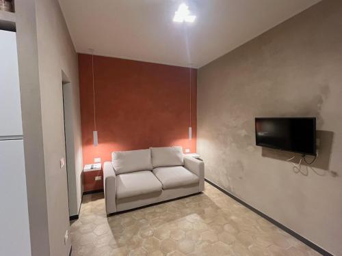 TV a/nebo společenská místnost v ubytování La casetta