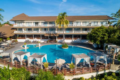 an aerial view of a hotel with a swimming pool at Cape Panwa Hotel Phuket in Panwa Beach