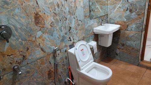 Koupelna v ubytování Sandora Home Stay