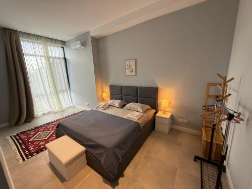 Postel nebo postele na pokoji v ubytování Villa Saguramo