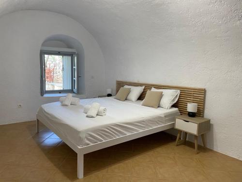 Ένα ή περισσότερα κρεβάτια σε δωμάτιο στο Rose Home