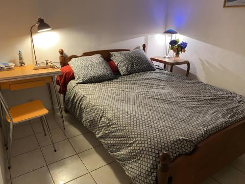 Ein Bett oder Betten in einem Zimmer der Unterkunft Ty Gweltas - Chambre 300 plage