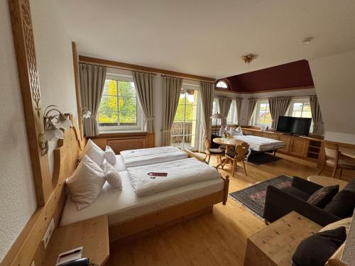 Postel nebo postele na pokoji v ubytování Hotel Wiesend