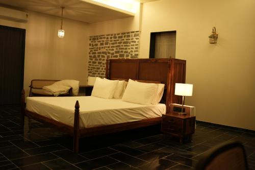 Ένα ή περισσότερα κρεβάτια σε δωμάτιο στο The Ridge Aravali