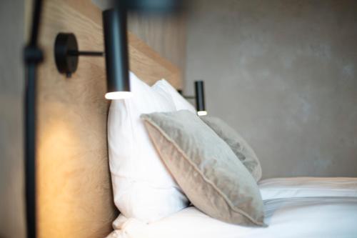 Postel nebo postele na pokoji v ubytování Hotel Djurhuus