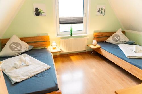 Voodi või voodid majutusasutuse Heimliche Liebe - Ferienhaus toas