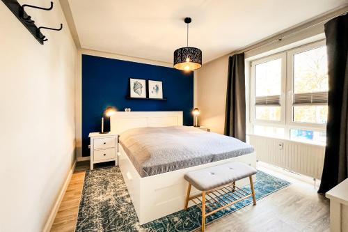 Ένα ή περισσότερα κρεβάτια σε δωμάτιο στο Residenz Seestern Wohnung 40