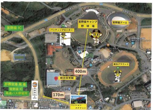 a map of a parking lot with yellow signs at Pension Snadun in Ginoza