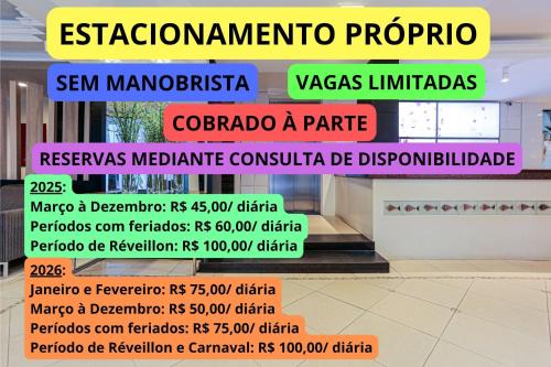 a bunch of signs on a wall in a building at Sandri City Hotel in Balneário Camboriú