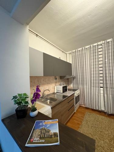 Η κουζίνα ή μικρή κουζίνα στο Topli kutak Baščaršija -FREE PARKING