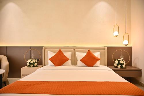 Postel nebo postele na pokoji v ubytování The Hoften Lotus Court, Greater Noida