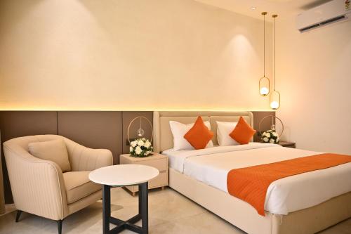 Postel nebo postele na pokoji v ubytování The Hoften Lotus Court, Greater Noida