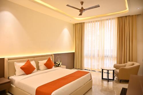 Postel nebo postele na pokoji v ubytování The Hoften Lotus Court, Greater Noida