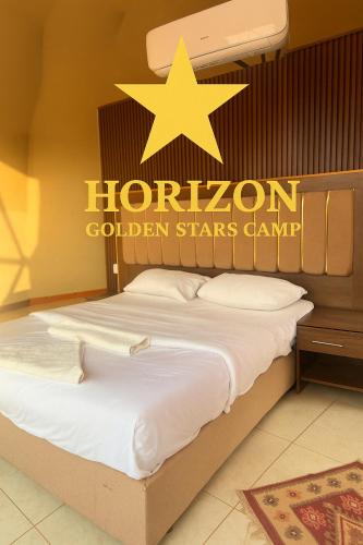 Giường trong phòng chung tại Horizon Star Golden Camp