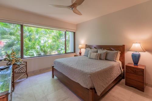 En eller flere senge i et værelse på 2BR Mauna Lani Point stunning Ocean Views