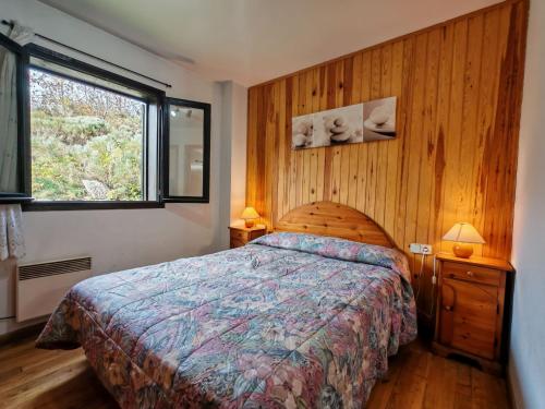 Postel nebo postele na pokoji v ubytování Chimenea, terraza y parking- Tu refugio acogedor - Besiberri 3