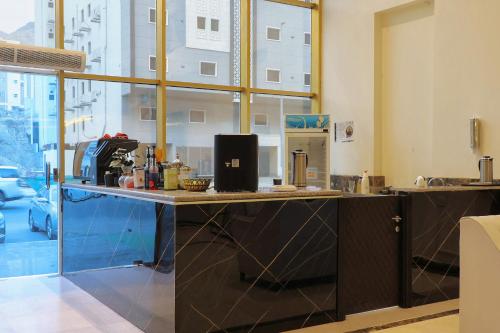 Kuchyň nebo kuchyňský kout v ubytování فندق بسمة الوحدة