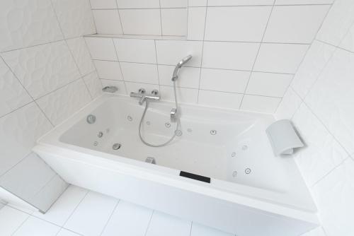 Koupelna v ubytování Logis Grand Hôtel Des Bains