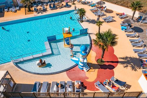 La alberca dentro o cerca de Camping Les Peupliers