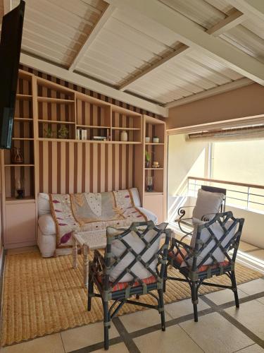 Posezení v ubytování CosyNest Apartment