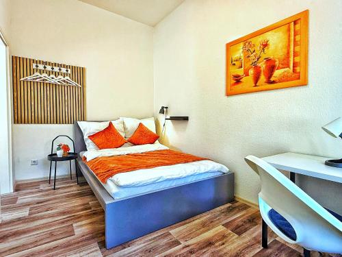 Ένα ή περισσότερα κρεβάτια σε δωμάτιο στο 2-SZ-Komfort-Apartment bis 5 Pers - Nähe HBF & Messe DUS