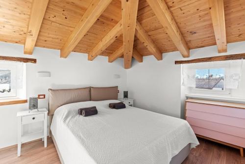 Postel nebo postele na pokoji v ubytování Casa In Centro - Brtonigla