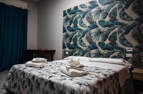 Ένα ή περισσότερα κρεβάτια σε δωμάτιο στο Etna Morada