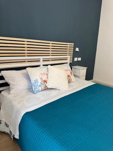 Postel nebo postele na pokoji v ubytování Coral B&B